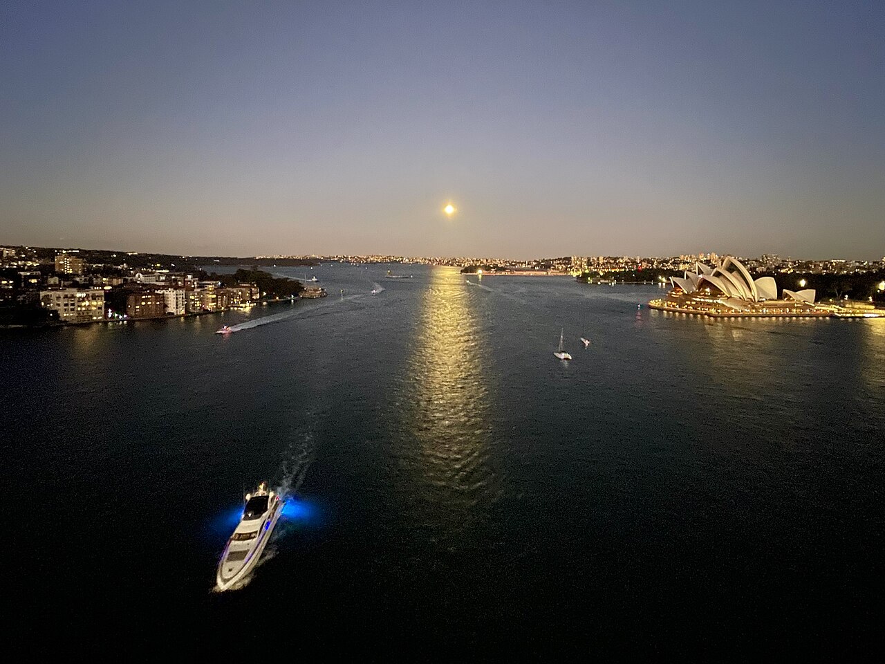 full moon over houses